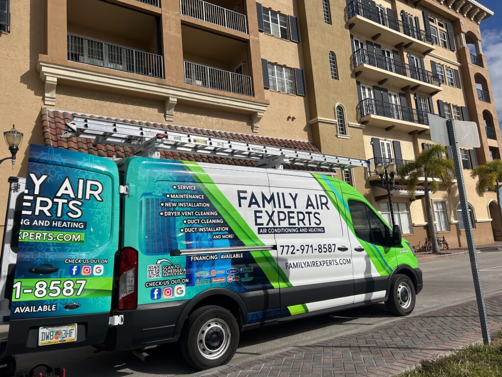 A Family Air Experts service van parked in a Treasure Coast landmark in downtown Fort Pierce, during the AC rebate season