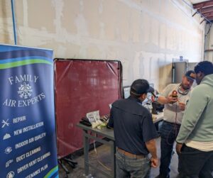 Nathan, Dalton, and Mario speaking with students about HVAC careers on the Treasure Coast