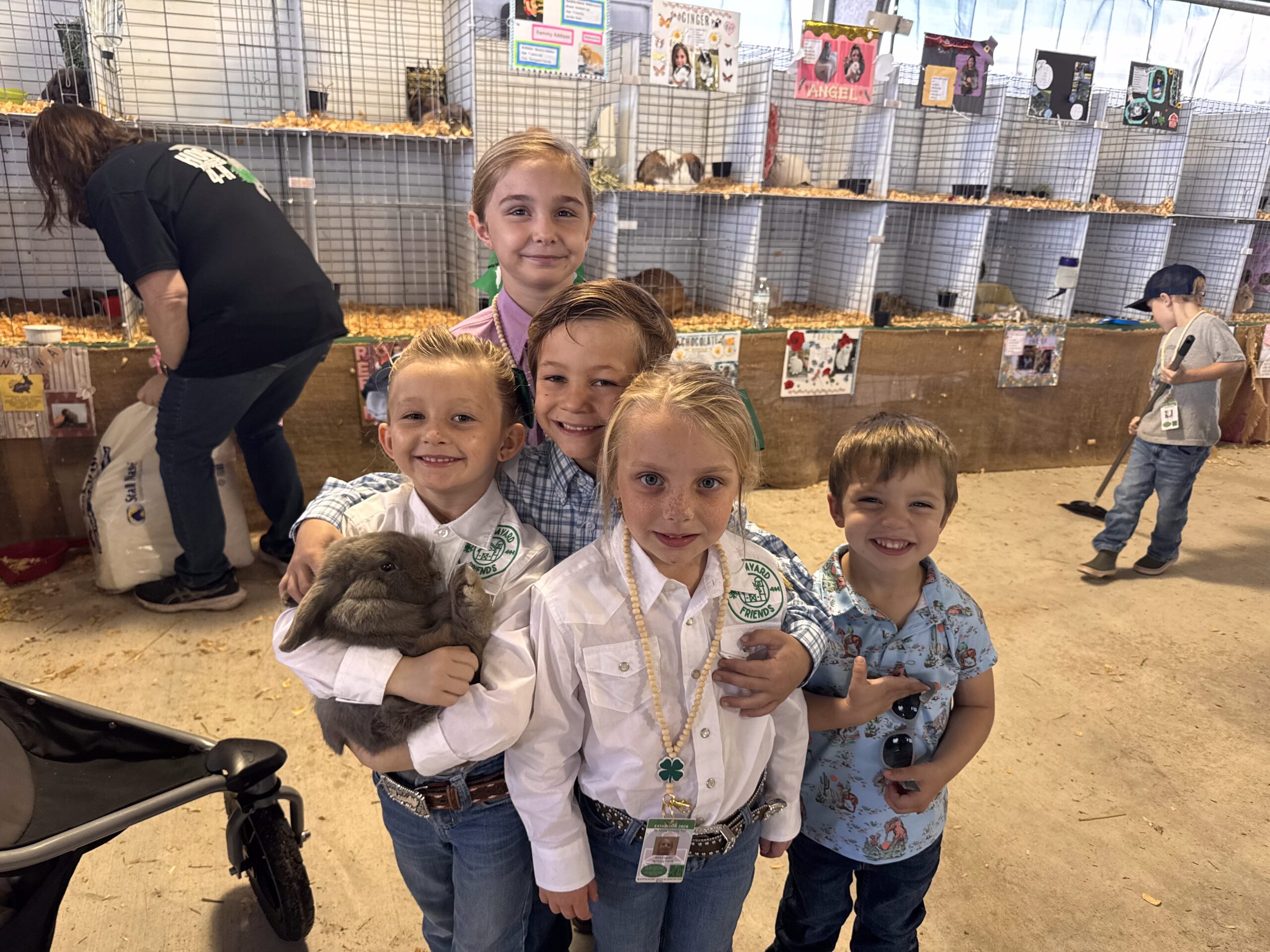 Our children at the rabbit show with their show rabbits at the Treasure Coast 4-H Club.