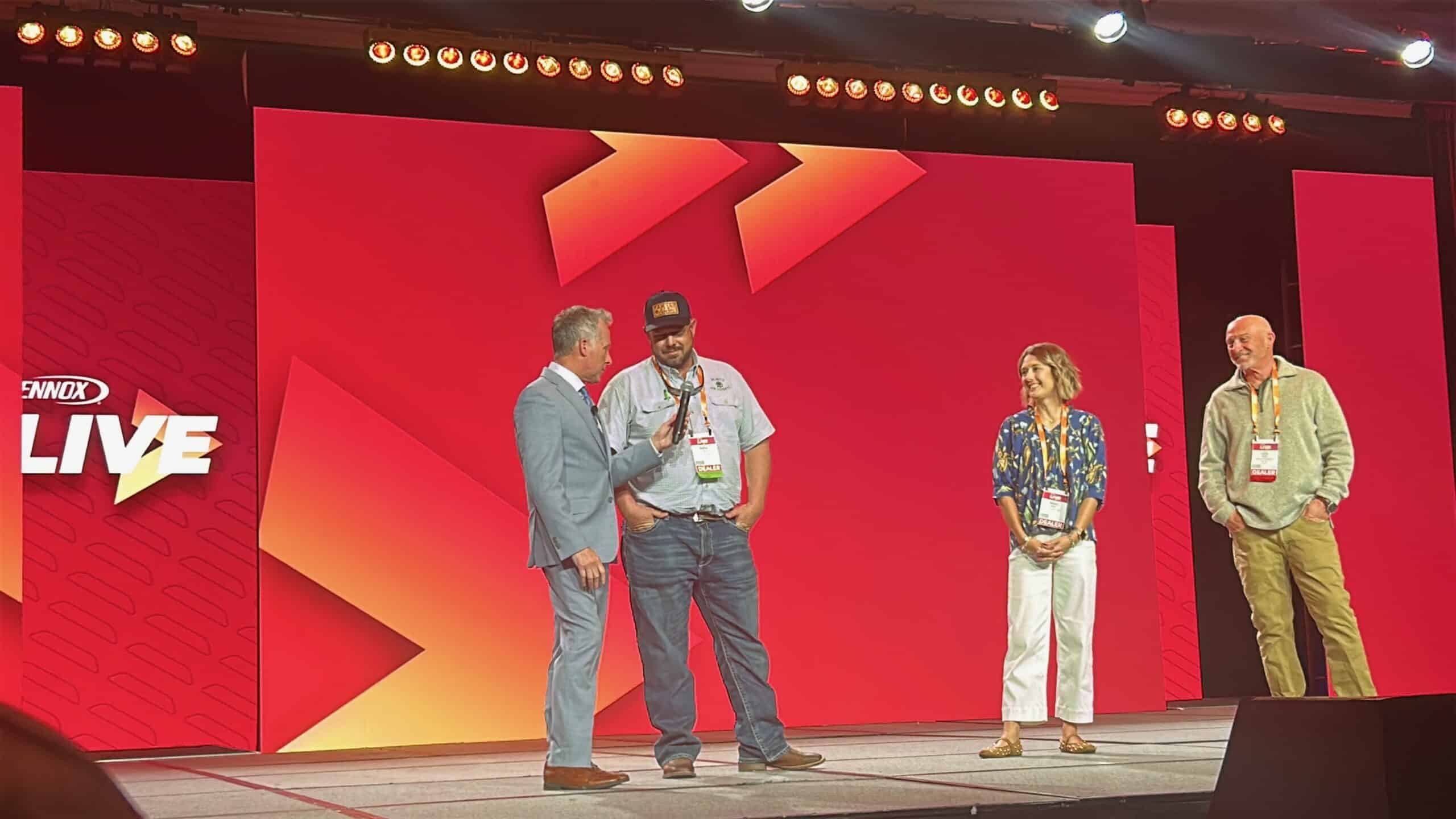 Family Air Experts attending Lennox Premier Dealer training at Lennox Live in New Orleans reviewing new HVAC technology