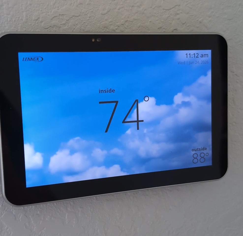 Indian River Estates Custom Home HVAC: Proven 2026 Fort Pierce Rebuild 7 Lennox smart thermostat display in a custom home HVAC project in Indian River Estates