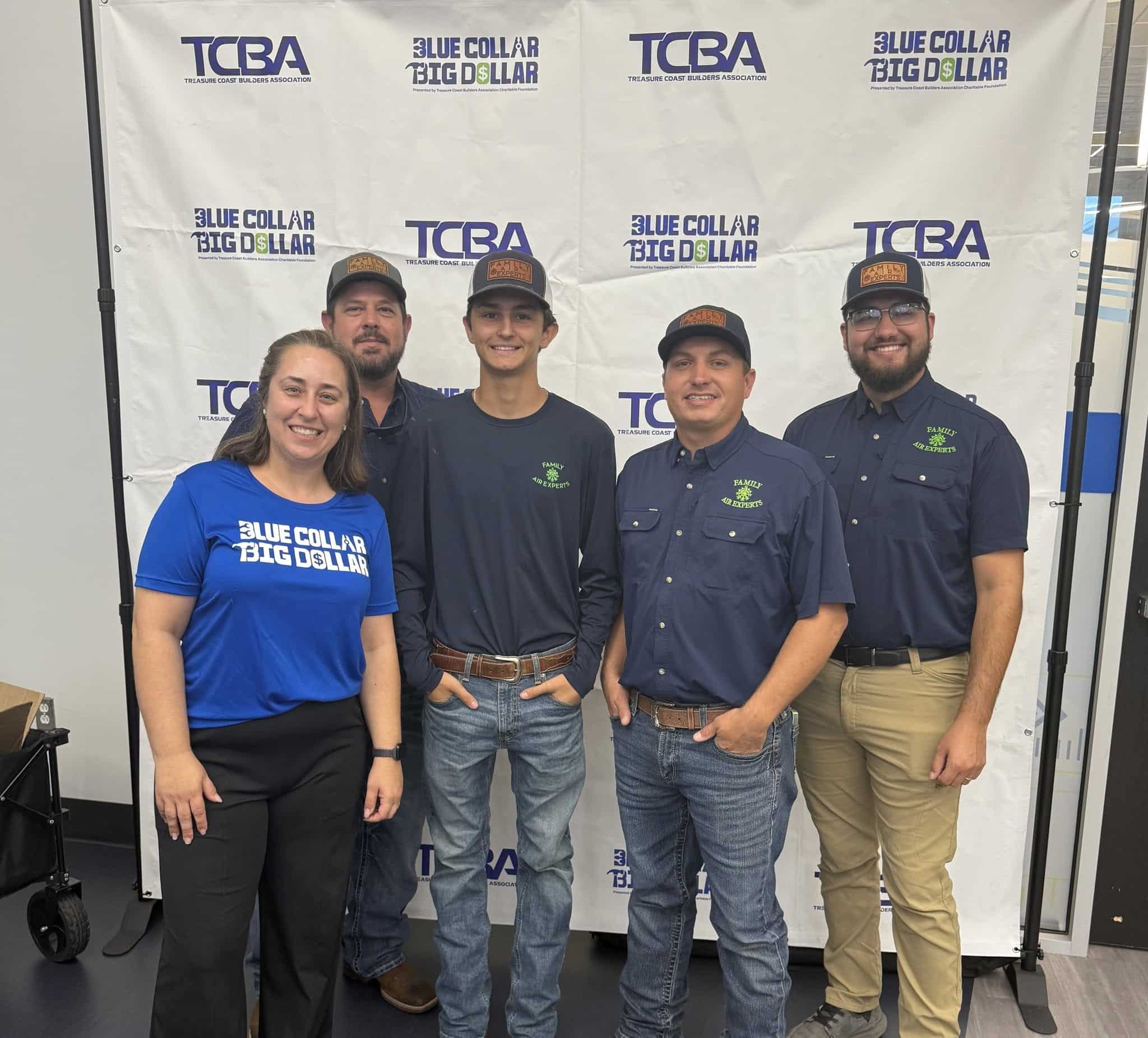Family Air Experts team speaking with young adults at TCBA Careers in Construction Week in Fort Pierce